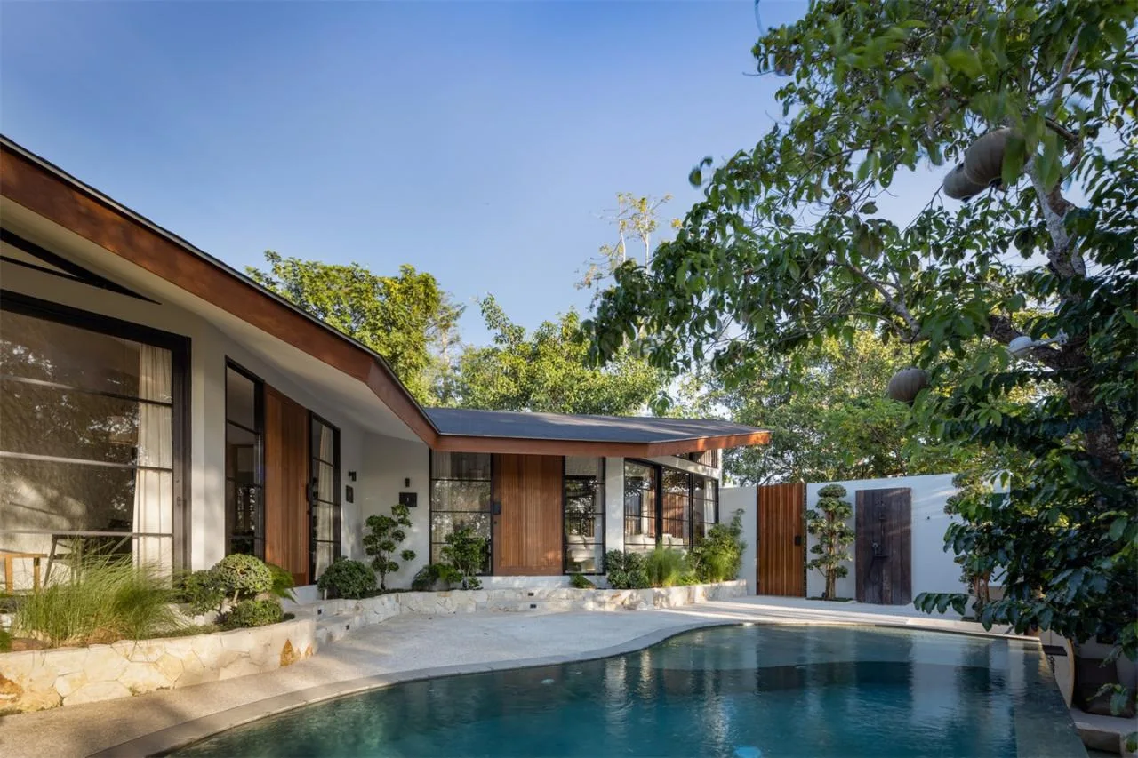 The Wabi Sabi Realm in the Poetic Forest: Design of a Natural Villa Under a Flipped Roof