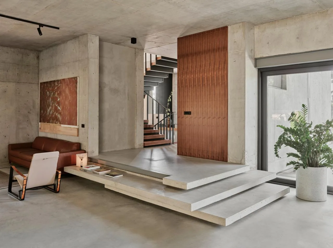 Design of a vacation villa combining concrete and glass for houses flowing through the forest