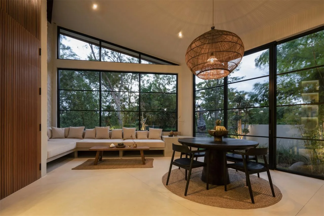The Wabi Sabi Realm in the Poetic Forest: Design of a Natural Villa Under a Flipped Roof