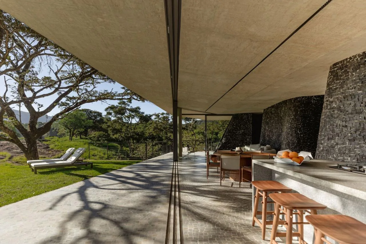 Design of a tranquil, natural, and poetic vacation villa nestled between mountains and forests