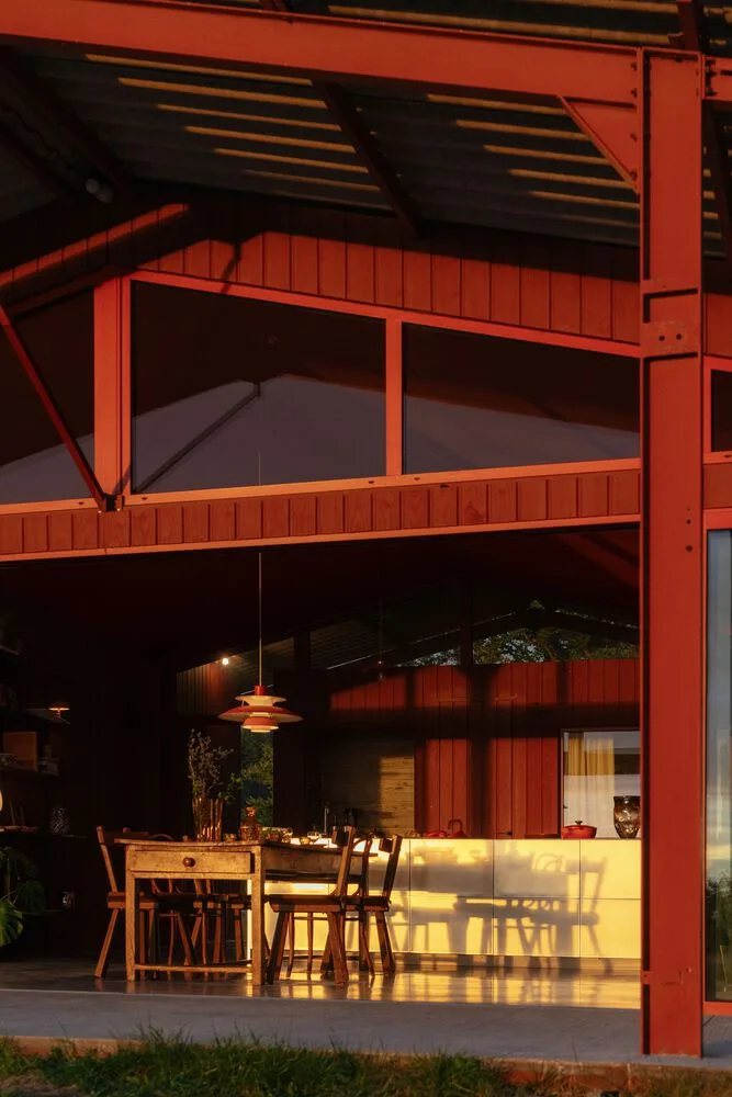 A serene vacation home design with red gemstones hidden in a lush and magnificent environment