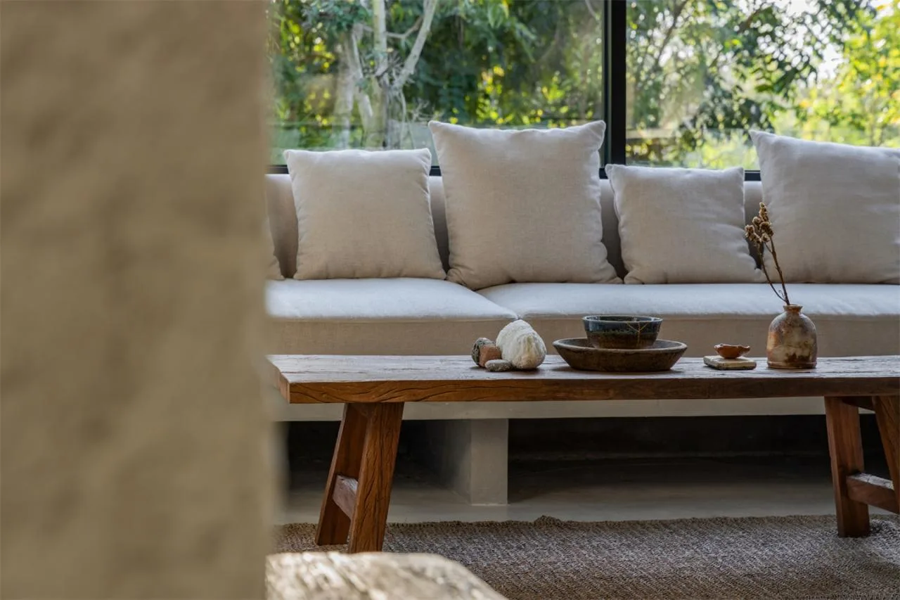 The Wabi Sabi Realm in the Poetic Forest: Design of a Natural Villa Under a Flipped Roof