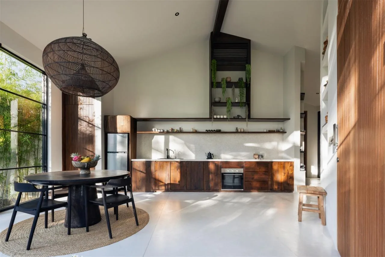 The Wabi Sabi Realm in the Poetic Forest: Design of a Natural Villa Under a Flipped Roof