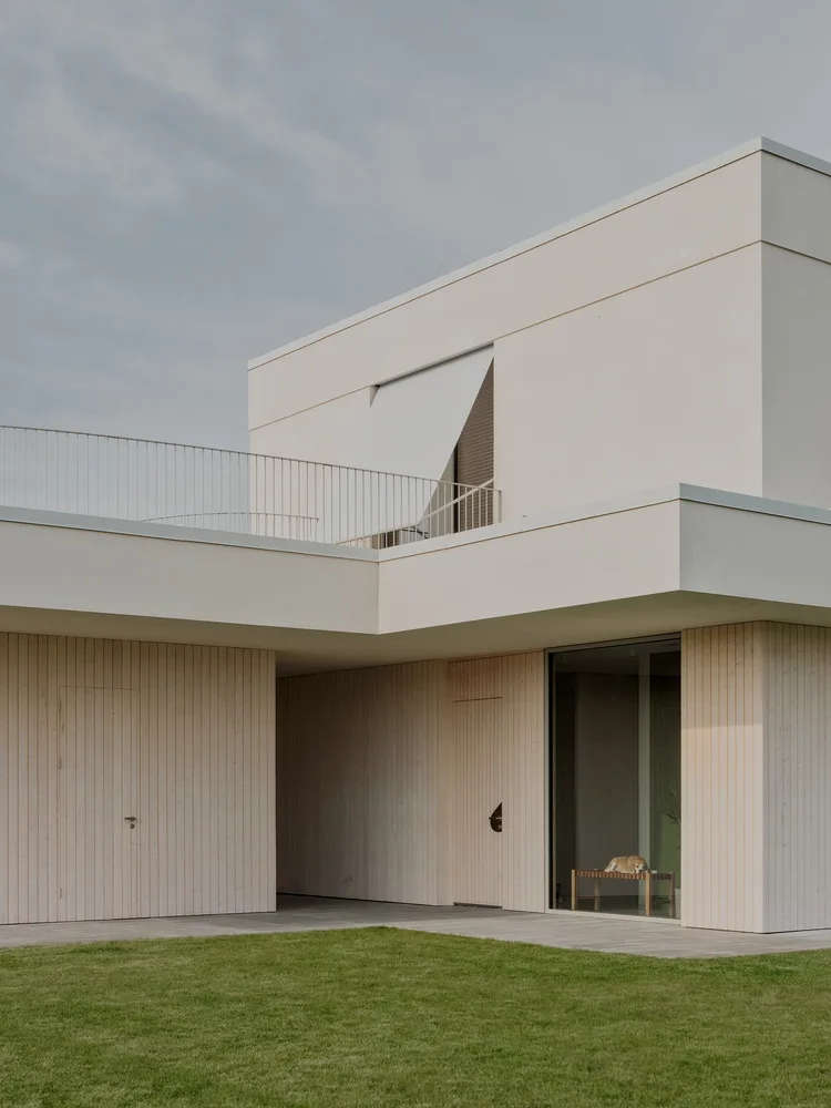 A minimalist villa design with warm, natural, smooth details, simple linear symmetry rhythm