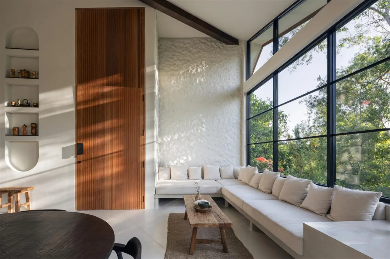 The Wabi Sabi Realm in the Poetic Forest: Design of a Natural Villa Under a Flipped Roof