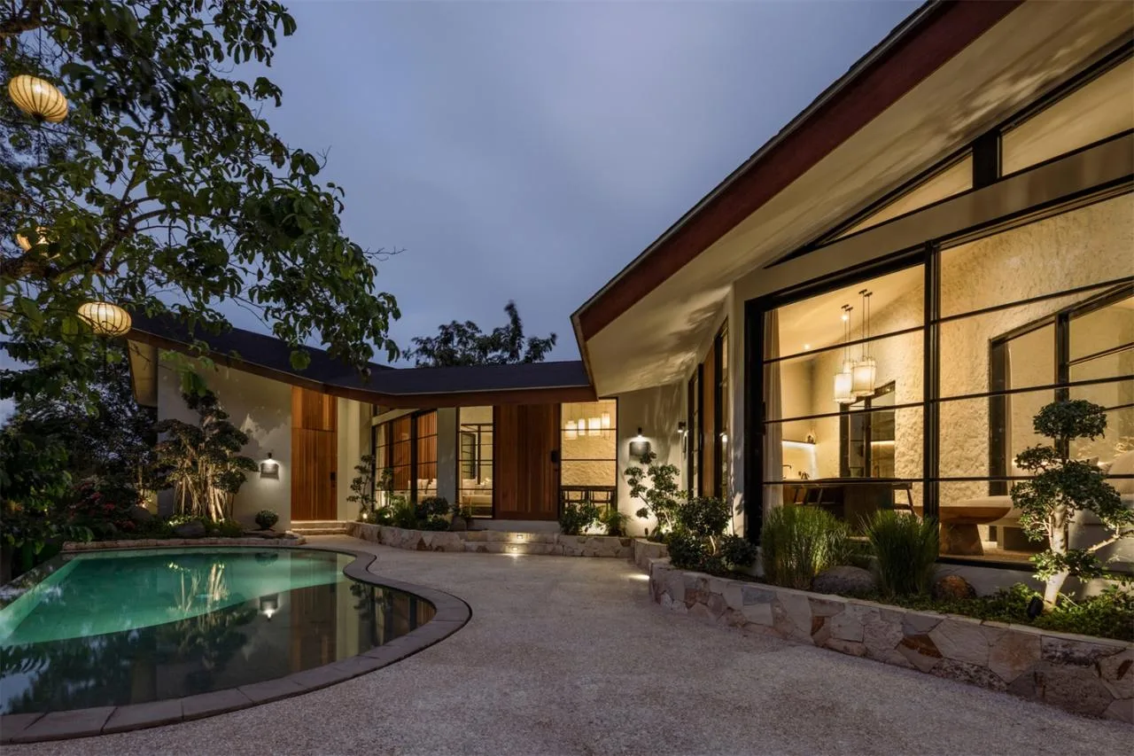 The Wabi Sabi Realm in the Poetic Forest: Design of a Natural Villa Under a Flipped Roof