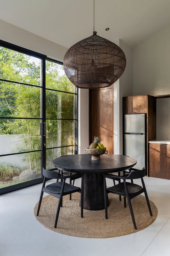 The Wabi Sabi Realm in the Poetic Forest: Design of a Natural Villa Under a Flipped Roof