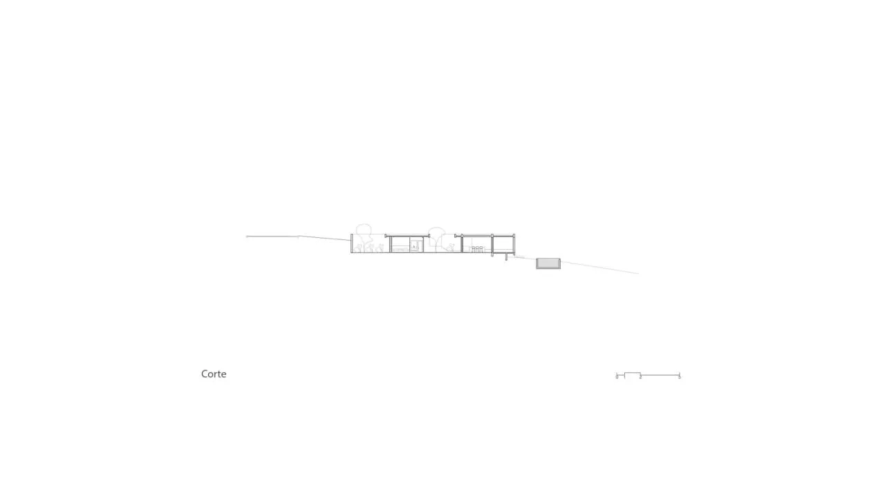 Design of a vacation home with a natural extension of the courtyard core by embedding the terrain underground