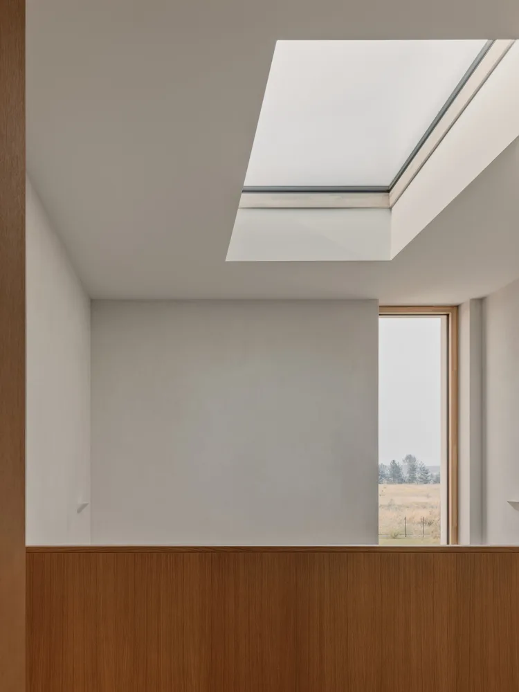 A minimalist villa design with warm, natural, smooth details, simple linear symmetry rhythm