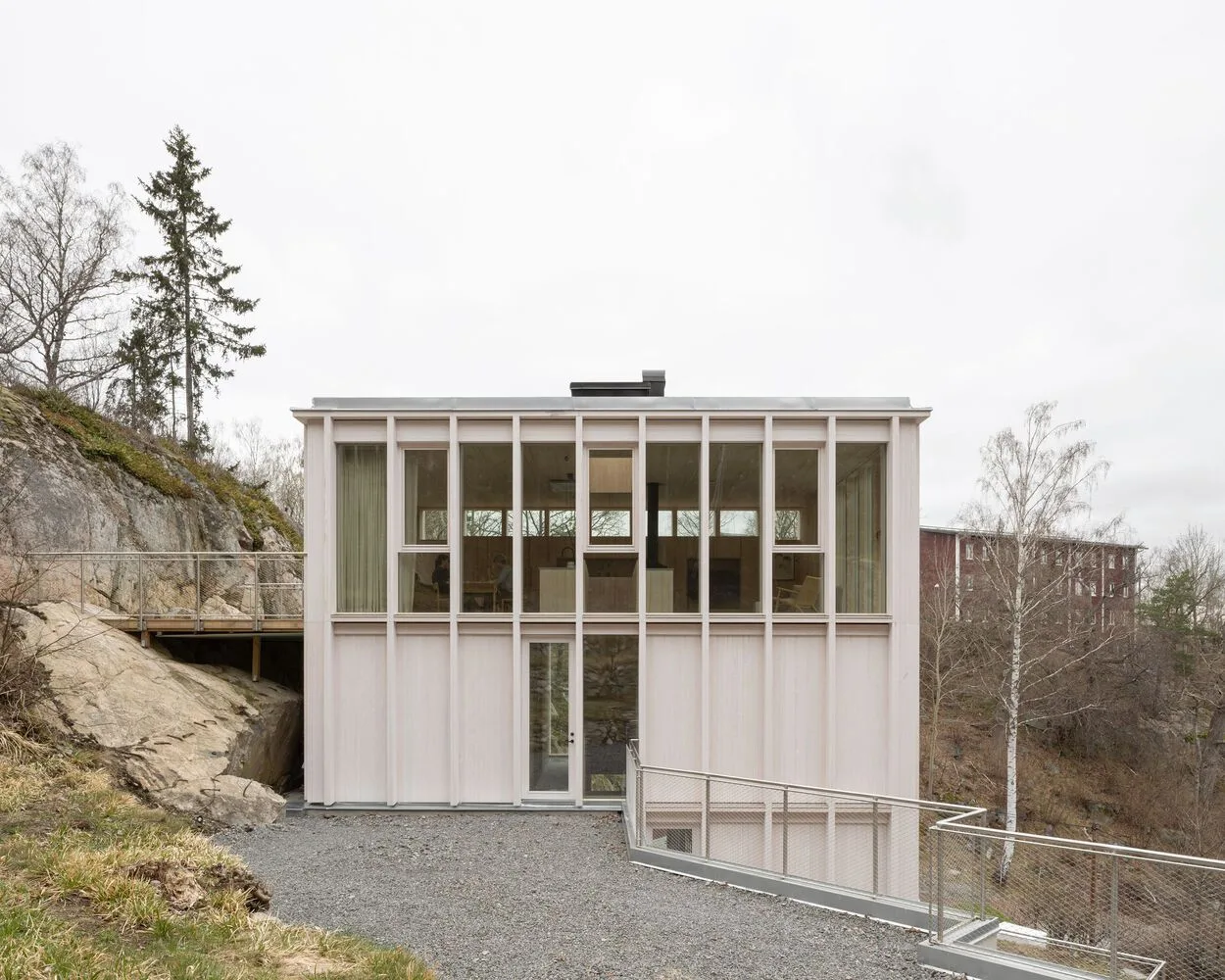 Miracle of architecture by the strait, challenging the terrain to create a stunning view of wooden villa design