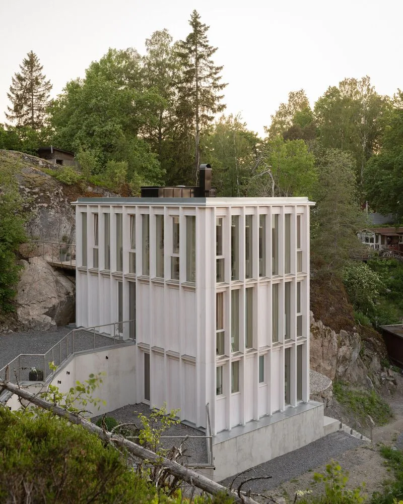Miracle of architecture by the strait, challenging the terrain to create a stunning view of wooden villa design