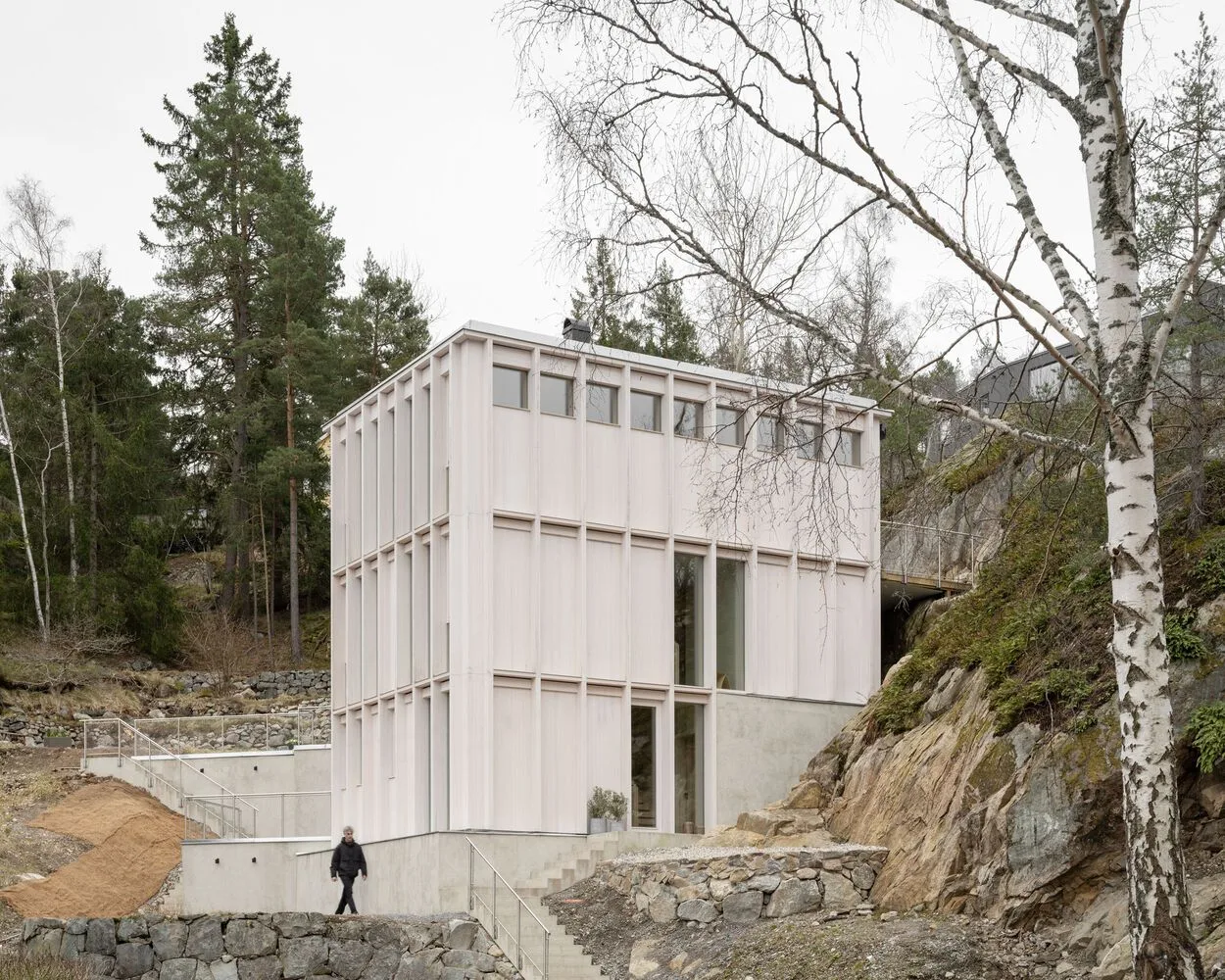 Miracle of architecture by the strait, challenging the terrain to create a stunning view of wooden villa design
