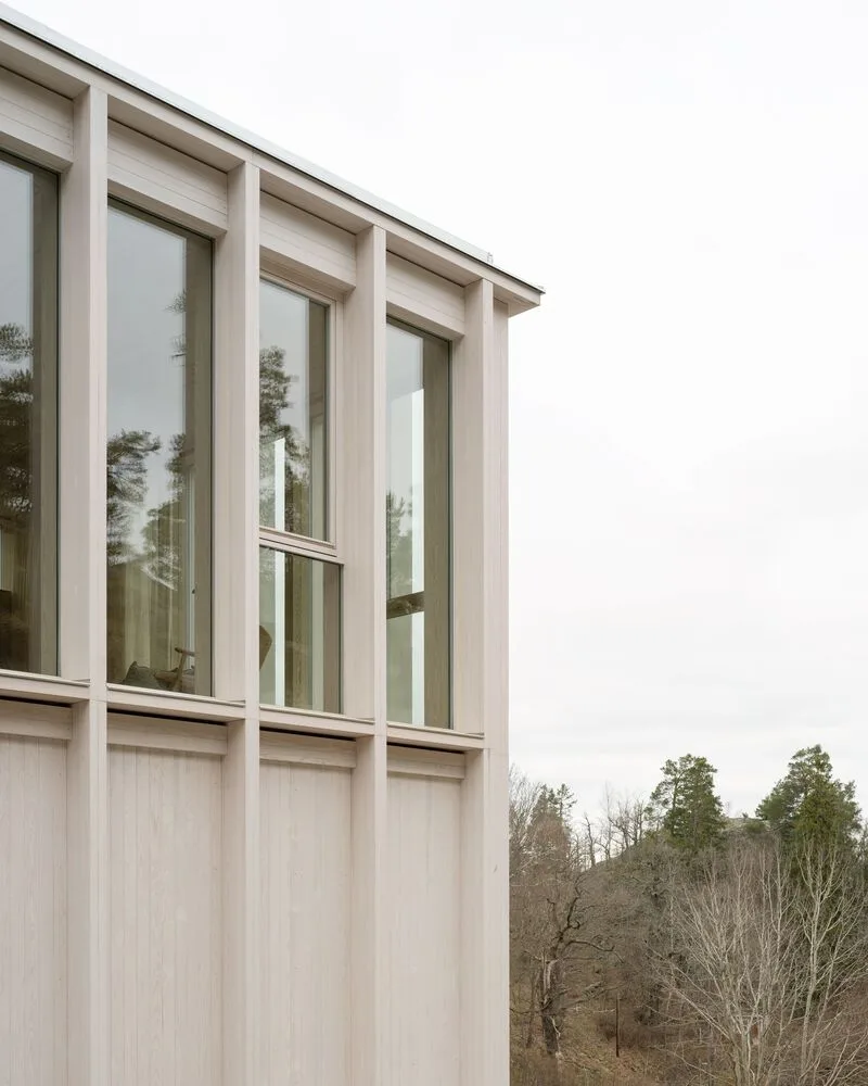 Miracle of architecture by the strait, challenging the terrain to create a stunning view of wooden villa design
