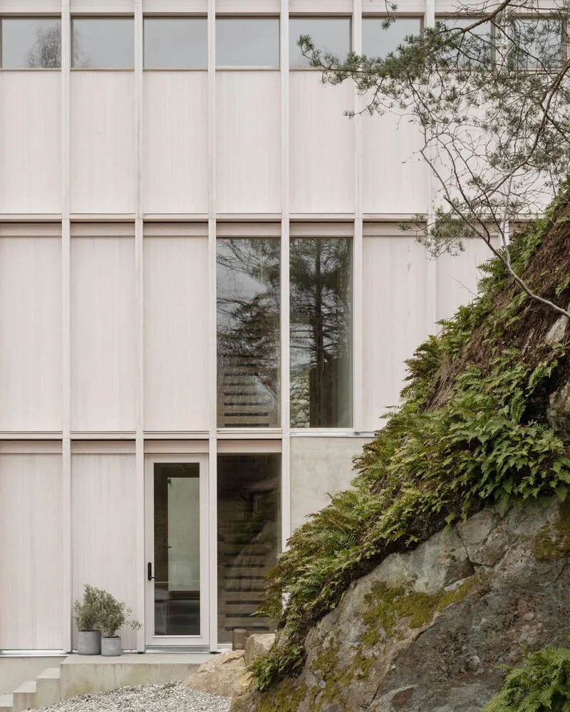 Miracle of architecture by the strait, challenging the terrain to create a stunning view of wooden villa design