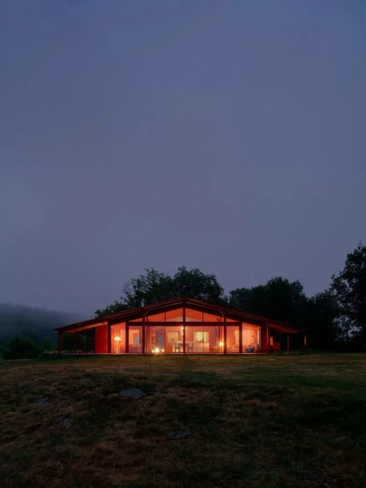 A serene vacation home design with red gemstones hidden in a lush and magnificent environment